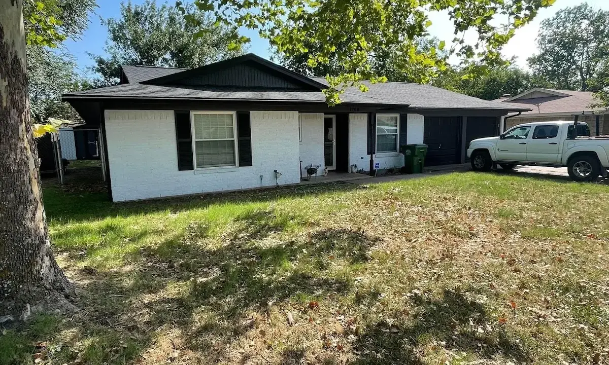 Professional roofing crew working on a residential roof in Joshua Tree